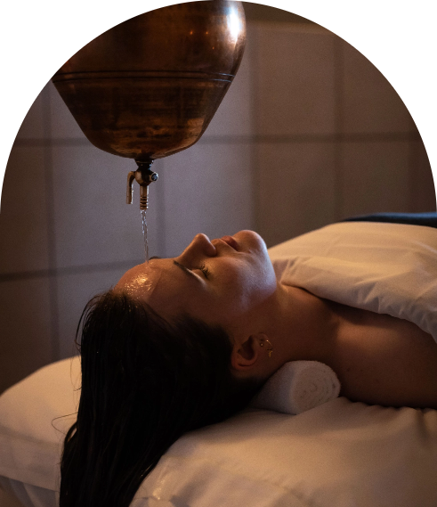 woman getting Ayurveda treatments in spa